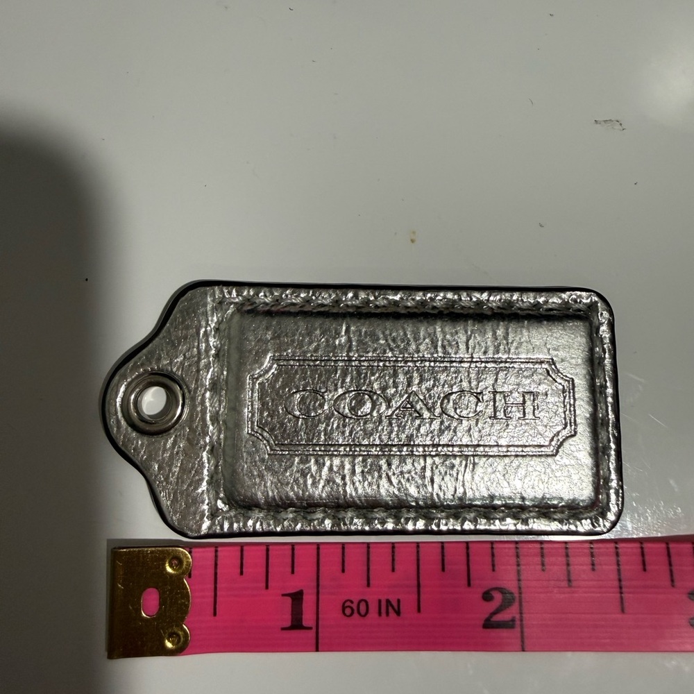 Coach metallic gray hangtag leather